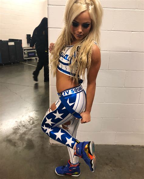 liv morgan sexy bikini|WWE Star Liv Morgans Stunning Gold Bikini。